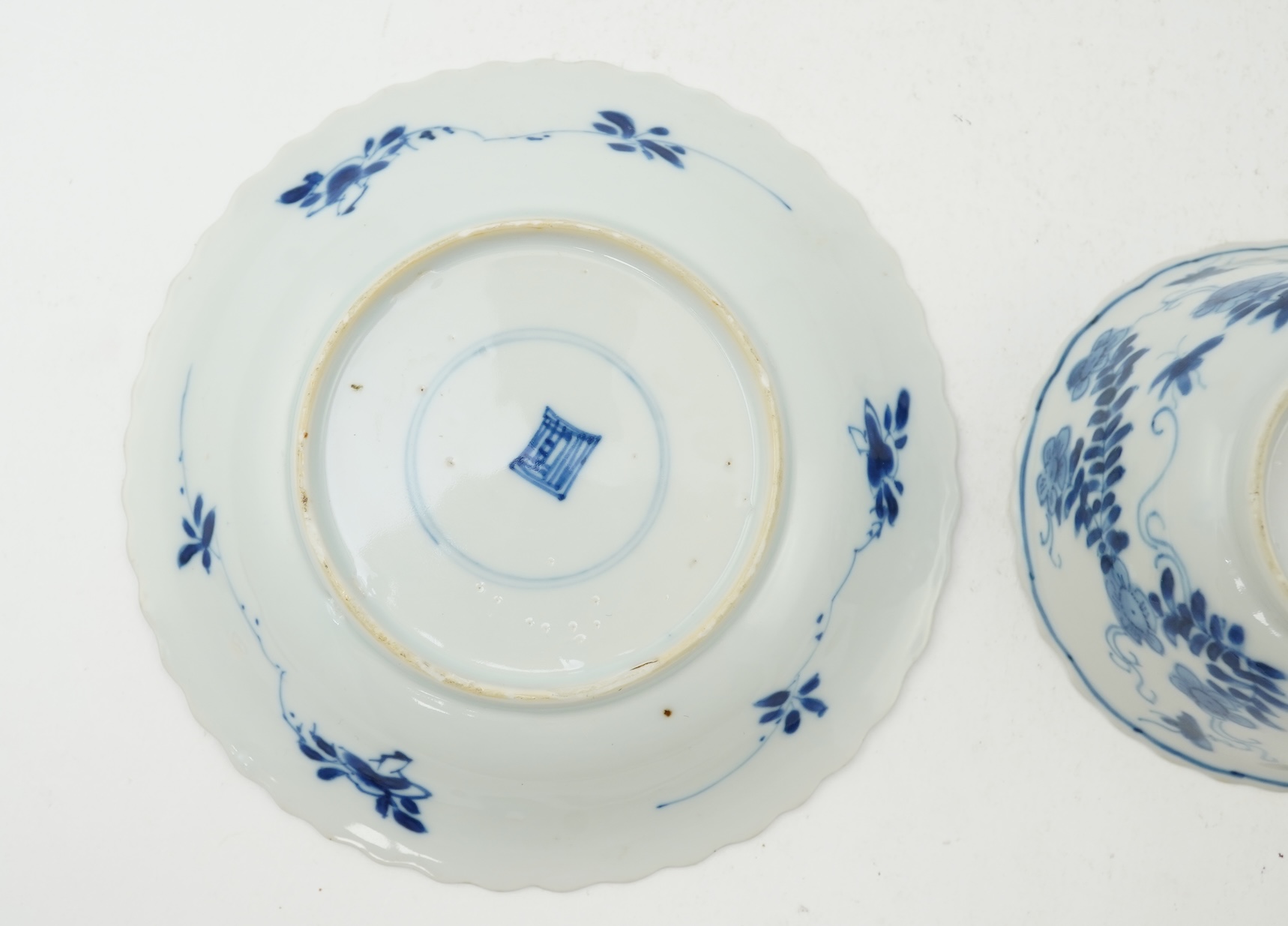 A Chinese blue and white tea bowl and saucer, Kangxi period